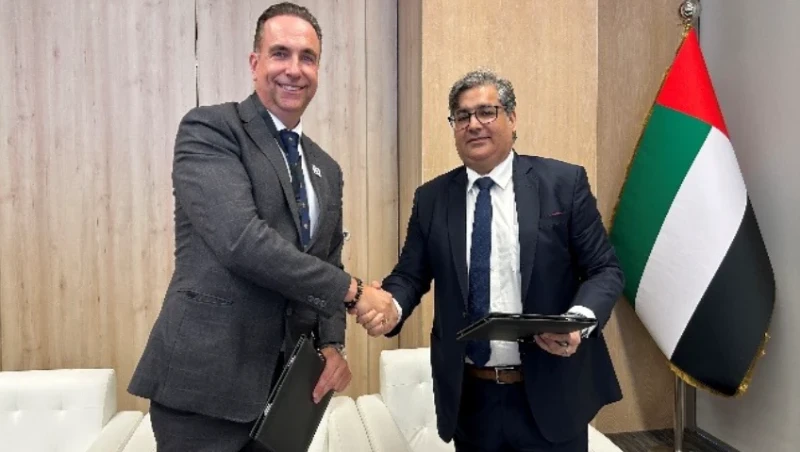 AAE and Thales representatives shaking hands after signing a Letter of Intent